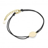 Silver bracelet with a black string and a gold-plated circle