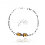 Silver amber bracelet with an infinity on a chain