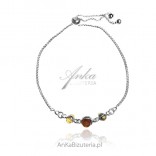 Silver bracelet with colored amber, pulled