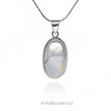 Silver pendant with a moonstone with a blue glow