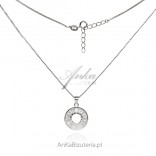 A silver ZIRCONIA WHEEL necklace with an interesting cut