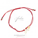 Gold-plated silver bracelet on a red string