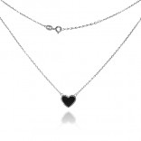 A silver necklace with a black enamel and diamond-shaped heart