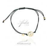 Gold-plated silver bracelet on a green string Tree with a Greek pattern