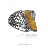 Oxidized silver ring with yellow amber