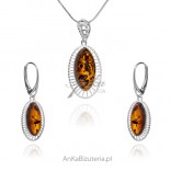 A set of silver jewelry with cognac amber