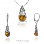 A set of oxidized silver jewelry with amber LEAVES