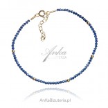Gold-plated silver bracelet with navy blue spinels