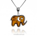 A silver pendant with amber. HAPPINESS EAR