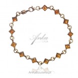 Gold-plated silver CUBE bracelet with cherry amber with scales