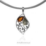 Silver pendant with stained glass amber