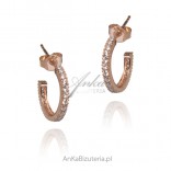 Silver earrings gilded with pink gold with white zircons