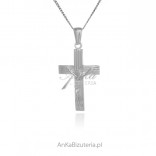 Silver cross with the image of JESUS