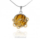 Silver pendant with cognac amber and gilded snake entwining