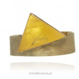 A unique gold-plated bracelet with a large yellow amber UNIQUE