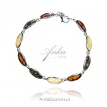 Silver bracelet with colored amber