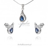 A subtle jewelry set with white and navy blue cubic zirconia