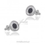 Flat hoop silver earrings with white and black zircons