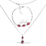 Silver necklace and bracelet with red zircons