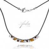 Silver necklace with amber on a rubber thong