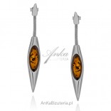 Long dangling silver earrings with amber