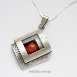 Elegant Jewelry. Silver pendant with coral