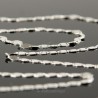 Srebrny łańcuszek-naszyjnik 45cm z mieniącymi się owalnymi kóleczkami.