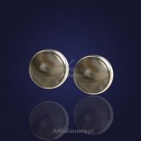 Hand-made silver earrings made of striped flint.