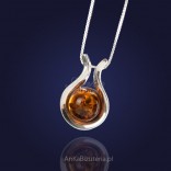 Captivating pendant on a chain with natural amber.