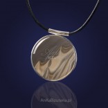 Unusual jewelry. Silver pendant with striped flint.