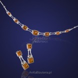 Silver set with natural amber. "The sun is enchanted in amber"