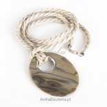 Silver jewellery. Pendant with striped flint on a linen cord.
