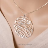 Large, round silver pendant - rhodium plated.