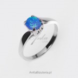 A ring with opal in a beautiful silver frame