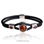 Silver bracelet from rubber and amber