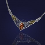Necklace made of rhodium silver with brown and green amber