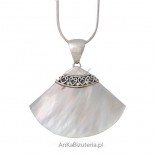 Silver pendant of the highest quality and white seashells