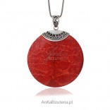An oriental pendant with natural coral and oxidized silver