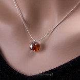 Pendant with amber on a chain. Silver jewellery