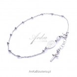 Silver bracelet. Rosary with a cross and a medal