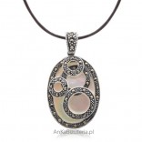 Silver pendant with marcasites on mother of pearl